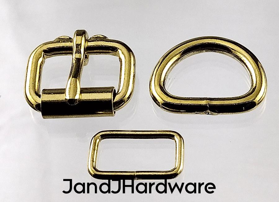 3/4 inch brass plated maker pack consisting of two each of a heel bar roller buckle, D ring, and belt keeper.
