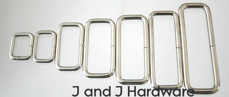 An image of a group of belt keepers or wire loops in nickel plate from 1/2 to 2 inch in width.